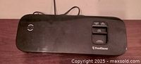 Top view of FoodSaver vacuum sealer showing control buttons and branding