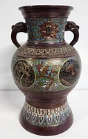Front view of bronze cloisonne vase showing body and handles