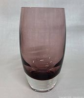Front view of the purple art glass vase showing gradient coloring and tapering shape