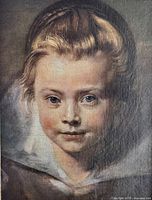 Close-up of the print showing the child's face with blond hair and blue eyes painted in style of Paul Rubens.