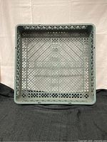 Top view of the square dishwasher rack showing grid design and structural braces