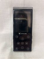 Front view of black Tenswall digital MP3 music player showing screen and control buttons.