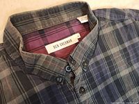 Close-up of the collar showing Ben Sherman label and button details