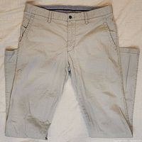 Beige Sunwill fitted khaki pants, front view showing overall condition and style.