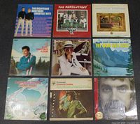 Front covers of all nine vinyl record albums in the lot visually displayed in a 3x3 grid