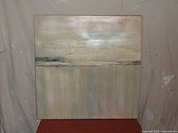 Front view of the square acrylic painting depicting a serene winter snow landscape with abstract horizontal division and muted color palette in blues and greys.