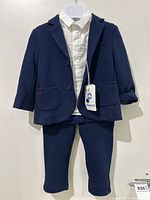 Full front view of navy blue baby suit set with white dress shirt on hanger showing jacket, pants, and shirt