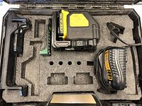 Laser level, battery pack, and charger in foam case