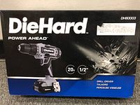 Photo of DieHard DH80003 cordless drill box front showing model, power rating 20V, 1/2 inch chuck, drill driver type in multiple languages.