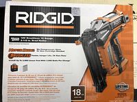 Box front showing Ridgid branding, model, and product image with features such as HyperDrive brushless motor, no compressor needed, and nail length capabilities.