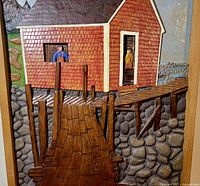 Close-up of carved dock, stone shoreline and bait shed facade