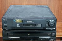 Front view of Sony SLV-920HF Hi-Fi stereo 4-head VCR stacked on top of Symphonic CD5800 5-disc CD changer player showing control buttons and tape/CD slots.