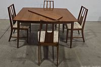 Full set: table, leaf on top, four chairs around