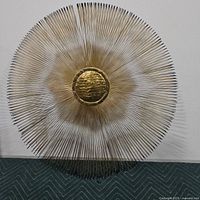 Full front view of the starburst wall hanging showing overall design and shape