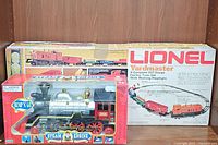 Photo of Lionel Yardmaster train set box and boxed Echo steam engine