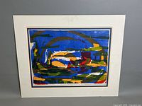 Front view of the colorful abstract lithograph framed with double mats showing the composition with blue, green, yellow, red, and white colors.