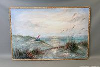 Full view of the seascape oil painting showing a figure seated on the grassy dunes near ocean water, framed by a rope border.