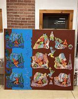 Full view of the large oil painting featuring stylized ships and figures with a blue vertical panel on the left, set against a brown canvas background.