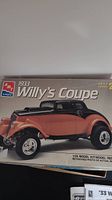 Box front of the 1933 Willys Coupe plastic model by AMT showing the car art and scale info.