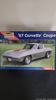 Front box photo of Revell Monogram '67 Corvette Coupe plastic model kit illustrating the car model on the cover.