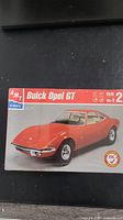 Front view of the sealed box showing red Buick Opel GT model picture and branding