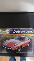 Front of sealed Revell Datsun 240Z model kit box showing car image and branding