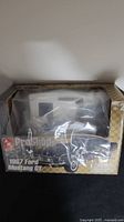 Front view of packaging showing 1967 Ford Mustang GT pre-decorated model kit by AMT Pro Shop with damaged/open box.