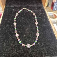 Full view of beaded necklace on display