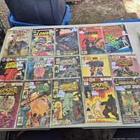 Full table view of all sixteen bagged comics
