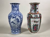 Front view of two Chinese porcelain vases: one blue and white featuring a dragon; the other Famille Rose colorful hand-painted scenes.