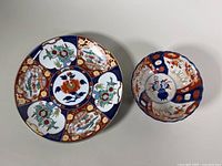 12.25 inch serving tray and 7.25 inch bowl displayed side by side from a top view showing full decoration.