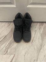 Front view of the Lugz boots showing padded tongue and lacing.