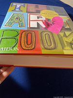 Front cover of 'The Art Book' by Phaidon with colorful block lettering and new edition sticker.