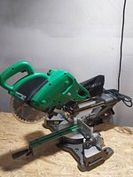 Full view of saw on cast aluminum base with sliding rails extended