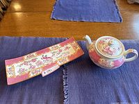 Overview of platter and teapot on table