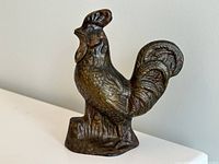 Rooster mechanical coin bank angled left front showing detailed cast iron and patina