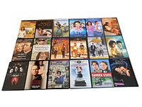 Top-down view of all 18 DVDs arranged in rows showing cover art and titles for each movie.