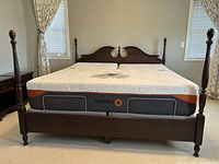 Front view of bed frame with mattress in place
