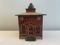 Front view showing embossed ‘HALLS EXCELSIOR HOTEL’ lettering above central door and flanked by two lattice windows.