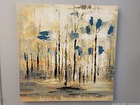 Full front view of the 24x24 inch abstract forest painting on canvas with tree trunks and blue and grey accents, signed by Luna.