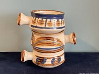 Three Stonecrest Palace Soup Bowls stacked to show profile and handle shape and color