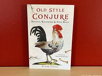 Front cover of 'Old Style Conjure' softcover book by Starr Casas, featuring title, subtitle, rooster illustration, and author name.