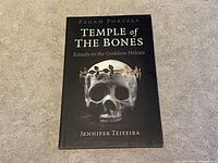 Front cover of the book showing the title, subtitle, author, and skull artwork.