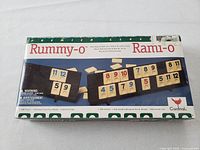 Box of Rummy-O game by Cardinal showing front with tiles and branding
