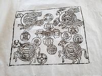 Full view of the vintage Tibetan/Nepalese print showing traditional symbols, script, and bird motifs in black ink on rice paper.