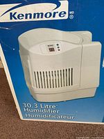 Box front showing Kenmore 30.3 litre humidifier image and brand logo.