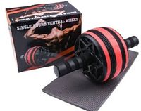 Ab roller wheel with black and red single round ventral wheel and foam handles, shown with packaging box featuring a muscular man and product branding.