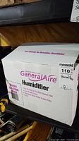 Boxed GeneralAire Model GF-3200 humidifier showing brand, model number, and product features.