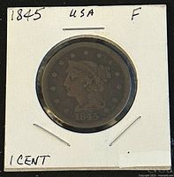 Obverse side of 1845 USA Braided Hair Large Cent Penny, showing Liberty with braided hair, 1845 date, mounted in cardboard holder.