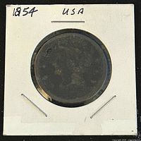 Front side of the 1854 Large Braided Hair penny in holder showing the head profile of Liberty with braided hair.